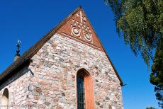 Church Village of Gammelstad, Luleå - Church Town of Gammelstad, Luleå: The east gable of the Nederluleå Church with a brick relief and a loop-hole. The...