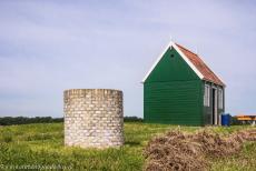 Schokland and Surroundings - Schokland and Surroundings: A water well next to a tiny wooden family house in Middelbuurt, a former fishing village. In the prehistoric...