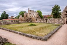 St. Augustine's Abbey in Canterbury - The ruins of the cloister of St. Augustine's Abbey&nbsp;in Canterbury, on the left hand side the roof of the archaeological excavation pit, on...