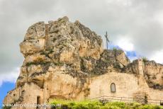 Sassi di Matera and Churches of Matera - The Sassi and the park of the Rupestrian Churches of Matera: The Church of Madonna de Idris towers high above the Sassi. The rock church is...
