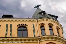 Historic Centre of Riga - Historic Centre of Riga: The Cat House is embellished with two statues of black cats on its roof. The Cat House was built in 1909. The legend...
